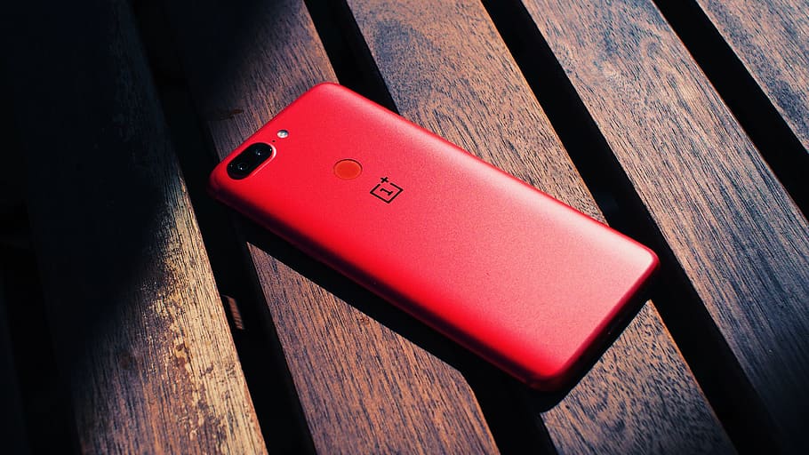 Close-Up Photography of Red Mobile Phone, back, cellphone, device HD wallpaper