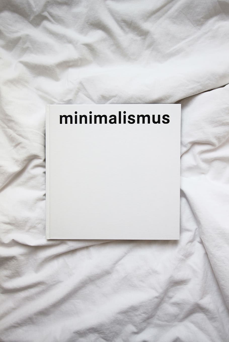 white printer paper, book, bed, minimal, design, type, typography HD wallpaper