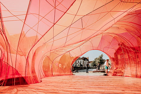 people walking underneath red cloth, person, human, path, walkway HD wallpaper