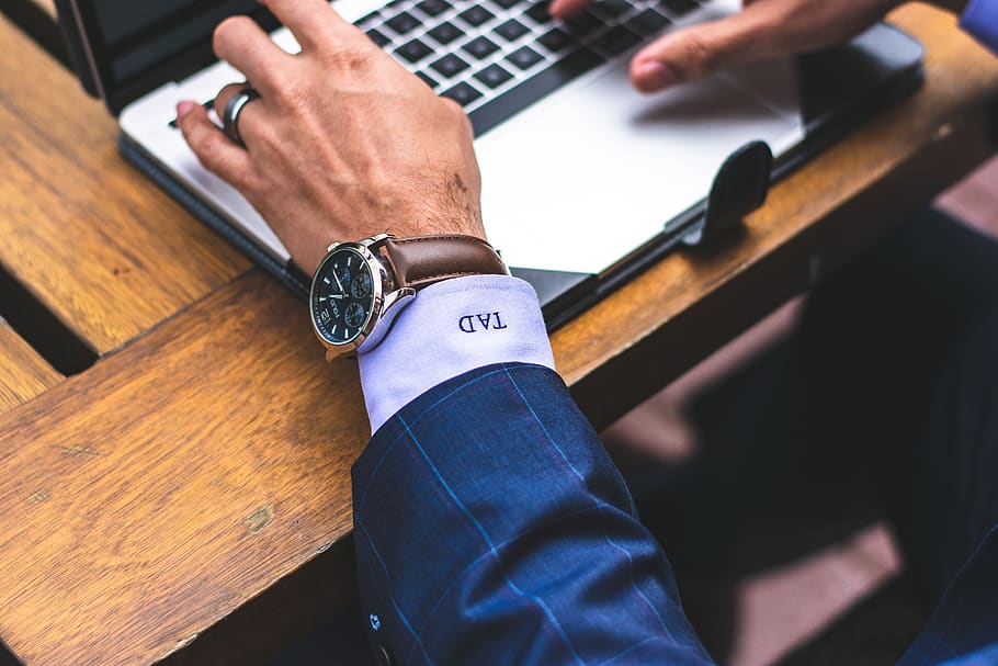 Man Using the Laptop Computer, business, close-up, commerce, desk HD wallpaper