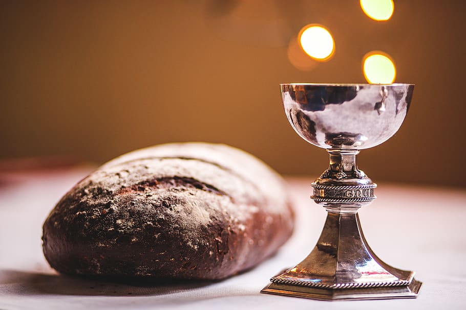 gray footed cup beside baguette bread, glass, goblet, new zealand