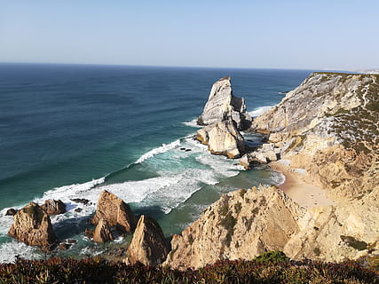 waves splashing on brown rocks, promontory, nature, cliff, ocean HD wallpaper