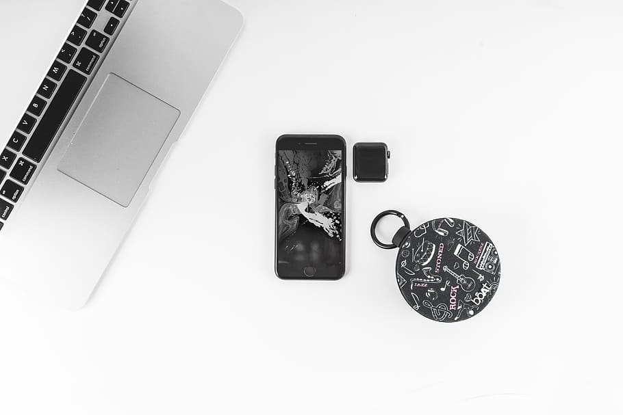 turned-on iPhone on white surface, still life, technology, high angle view HD wallpaper