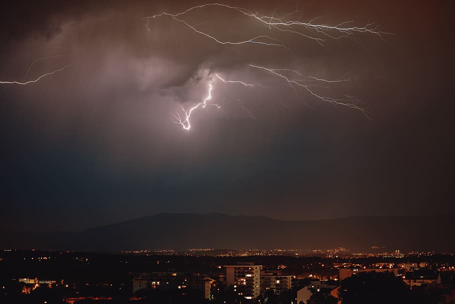 Hd Wallpaper Lightning Strike Over The City During Night Time Storm Nature Wallpaper Flare 