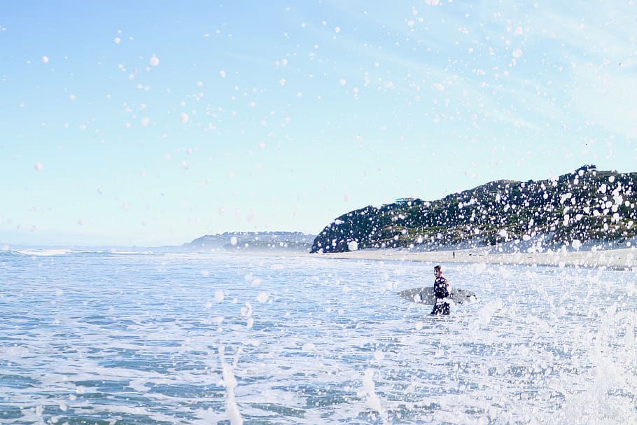 Person Carrying Surfboard Walking on Sea Water, action, beach HD wallpaper
