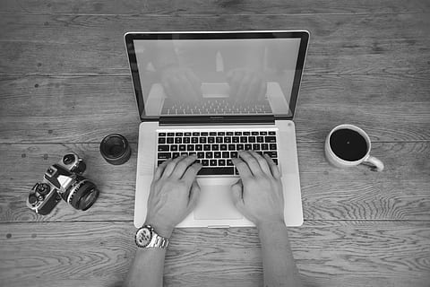 Gray Scale Photography of a Person Using Laptop, apple, black-and-white HD wallpaper