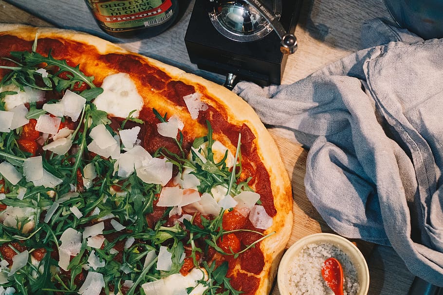 pizza beside gray textile, food and drink, ready-to-eat, freshness HD wallpaper