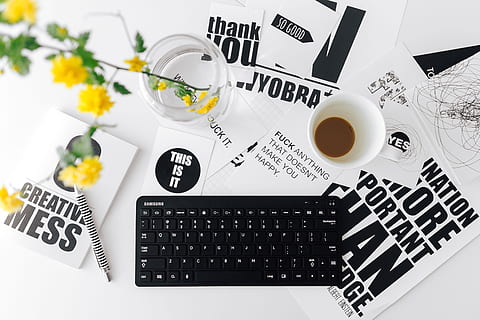Female hands typing on the remote wireless computer keyboard HD wallpaper