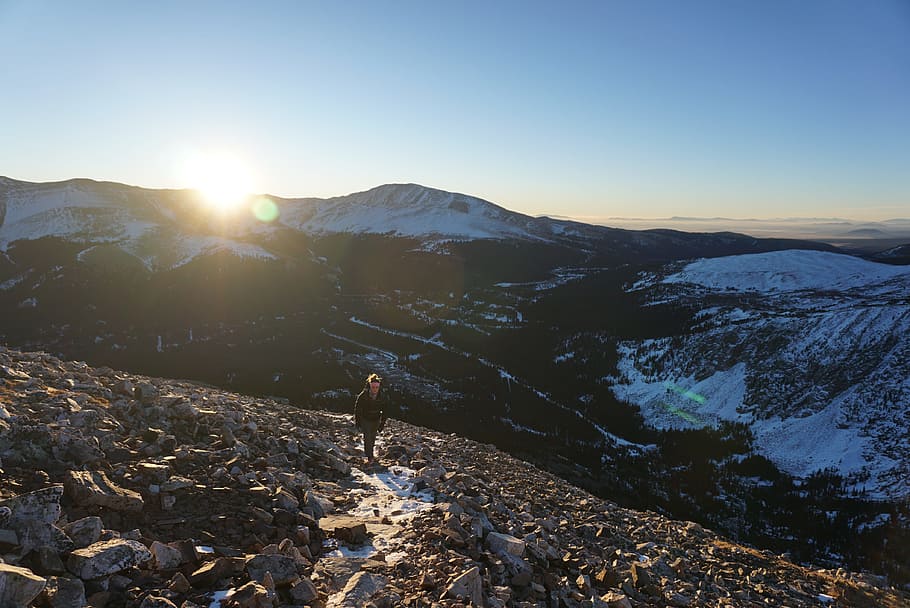 Person Walking on Mountain Covered in Stones, adventure, climb HD wallpaper