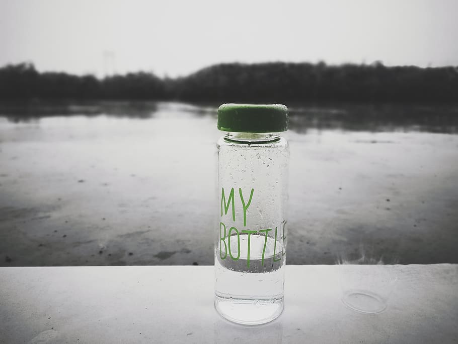 bottle, rain, alone, focus on foreground, table, lake, water HD wallpaper