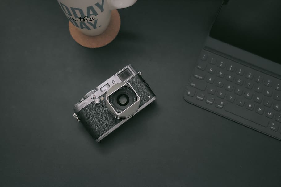 black-and-gray camera on table near tablet keyboard case, electronics, HD wallpaper