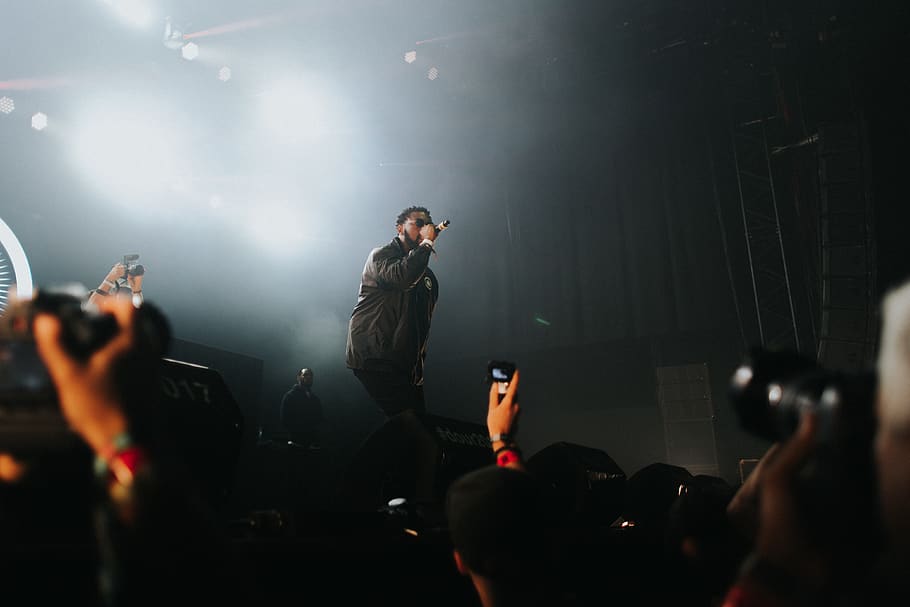 man performing on stage, lighting, human, crowd, person, concert HD wallpaper