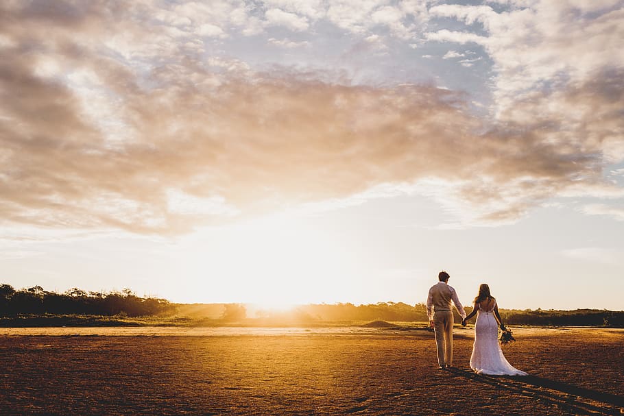 couple standing on road under sunset, human, person, apparel