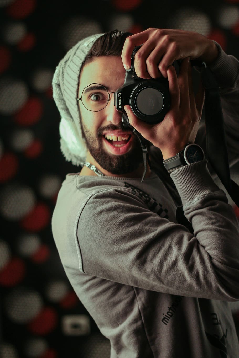 Man Holding Black Canon Dslr Camera, adult, beanie, clothes, eye, HD wallpaper