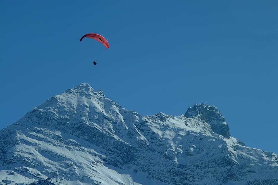 person paragliding, leisure activities, adventure, mountain, switzerland HD wallpaper