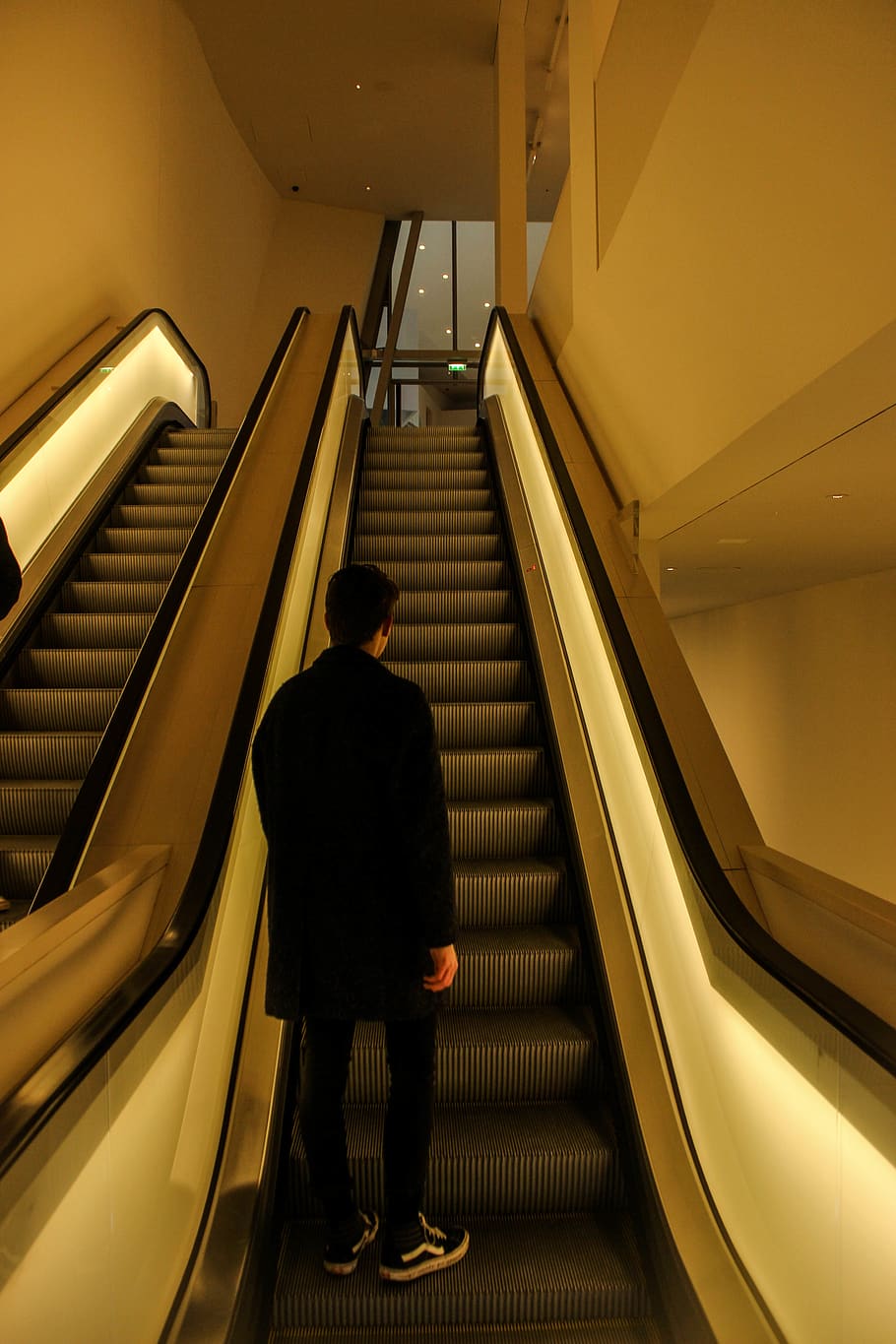 man standing on escalator, architecture, one person, steps and staircases HD wallpaper
