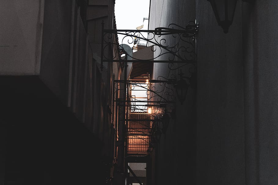 metal framed between narrow pathway, banister, handrail, home decor HD wallpaper