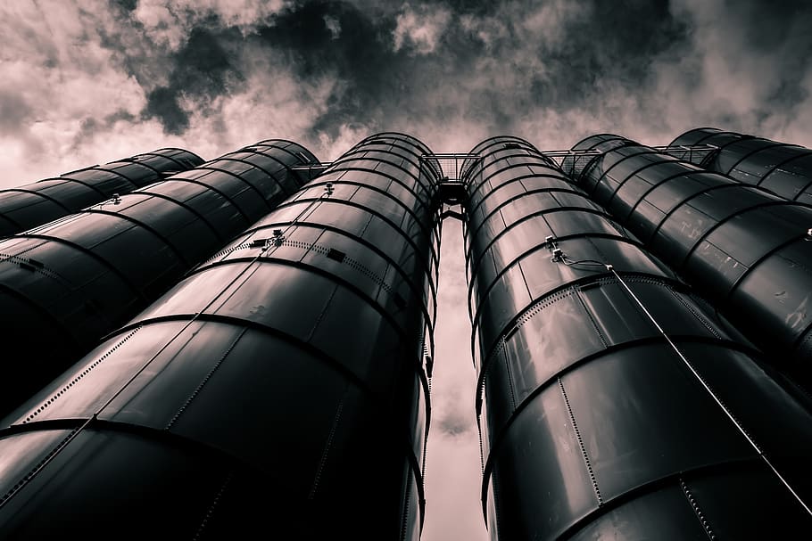 Low Angle Photo of Black Tower, clouds, dramatic, factory, industial