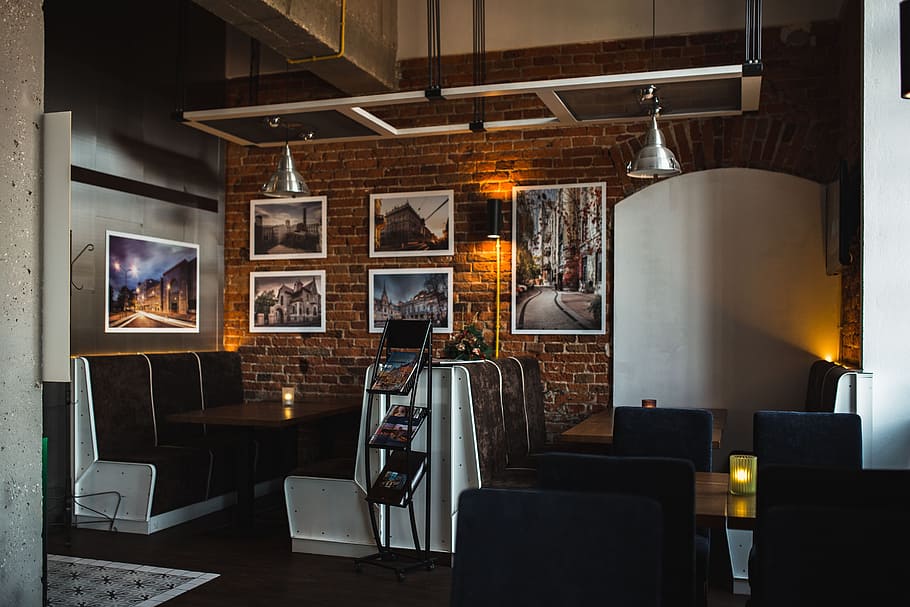 The modern cafe with cozy interior, loft, restaurant, bar, cosy