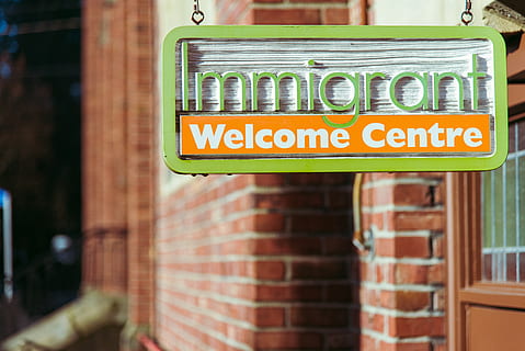 immigrant, welcome, centre, door, entrance, day, sign, wall HD wallpaper