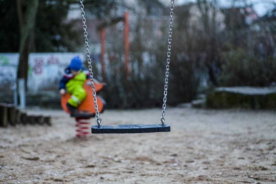 black swing chair hanging by gray chain, toy, germany, nuremberg