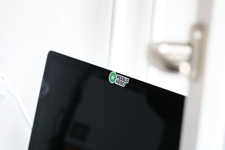 Closeup Photo of Opened Black Laptop Computer With Pexels Hero Sticker HD wallpaper
