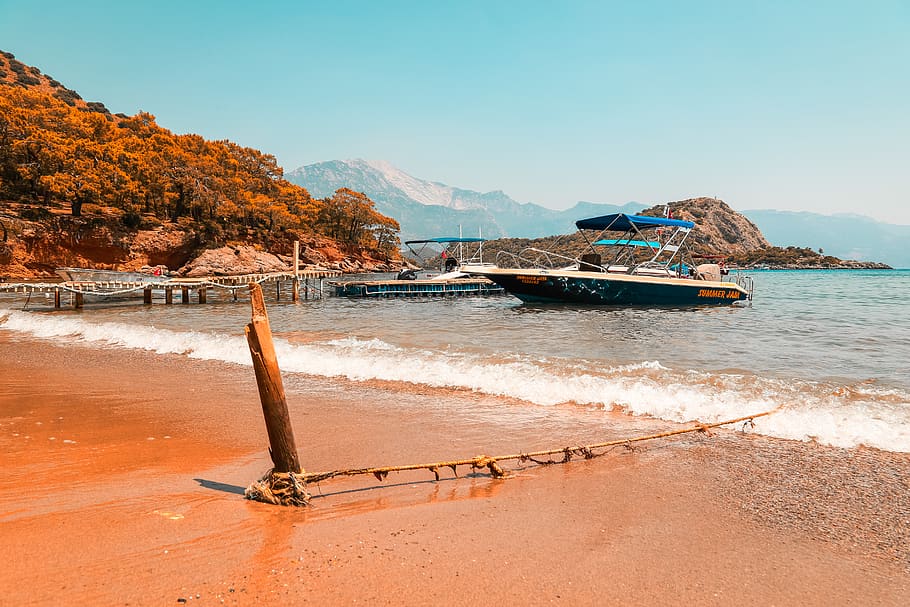 Blue Speedboat, bay, beach, daylight, dock, fall colors, horizon HD wallpaper