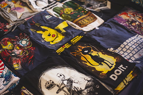 Assorted T-shirts, market, shop, store, high angle view, no people HD wallpaper