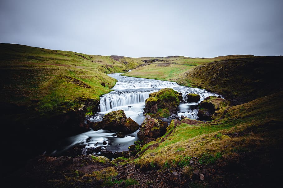 river beside grass field, stream, outdoors, water, iceland, skógafoss HD wallpaper