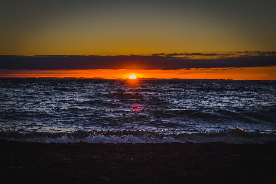 Photography of Sea during Sunset, afterglow, beach, beautiful HD wallpaper