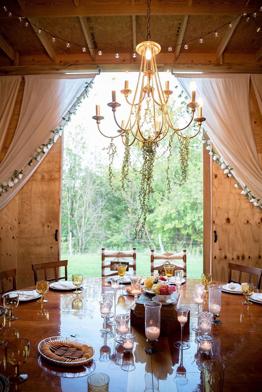 fine dining under gold chandelier, indoors, table, food and drink