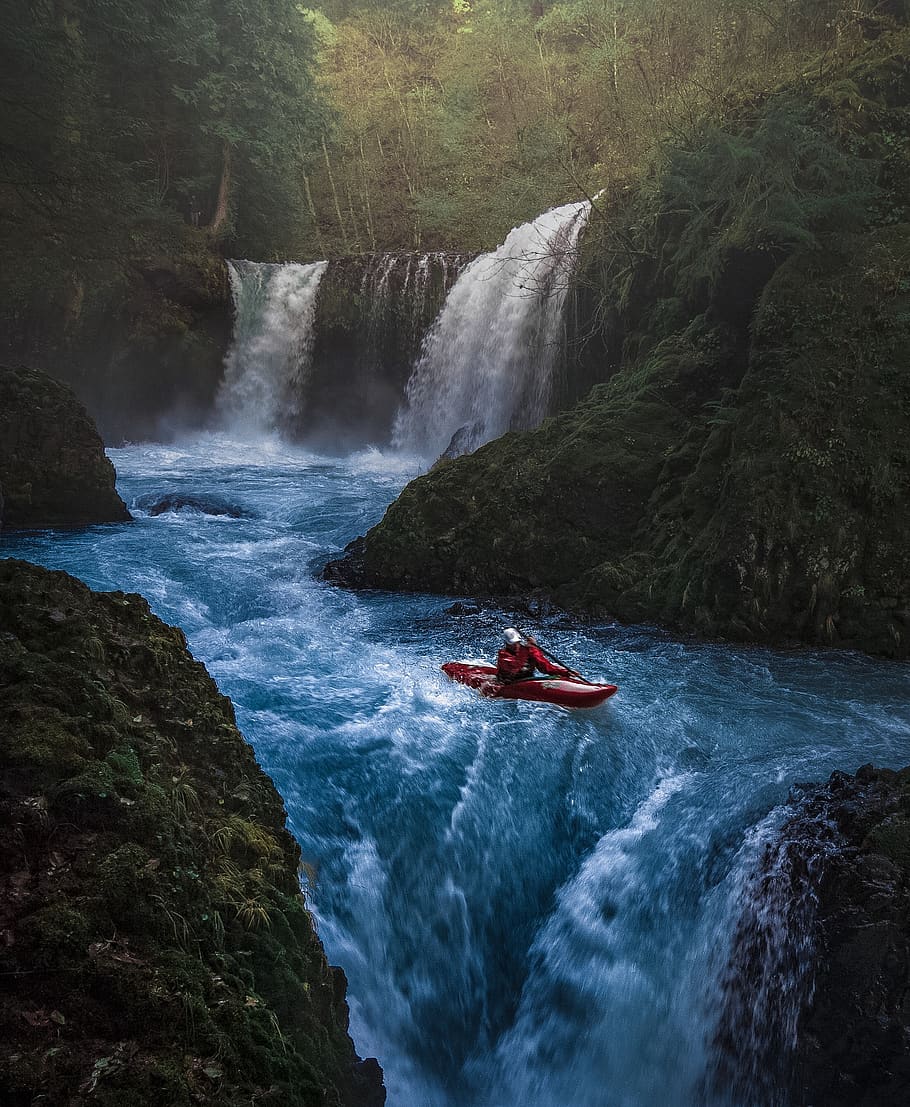 Person on Watercraft Near Waterfall, adventure, blue, daylight