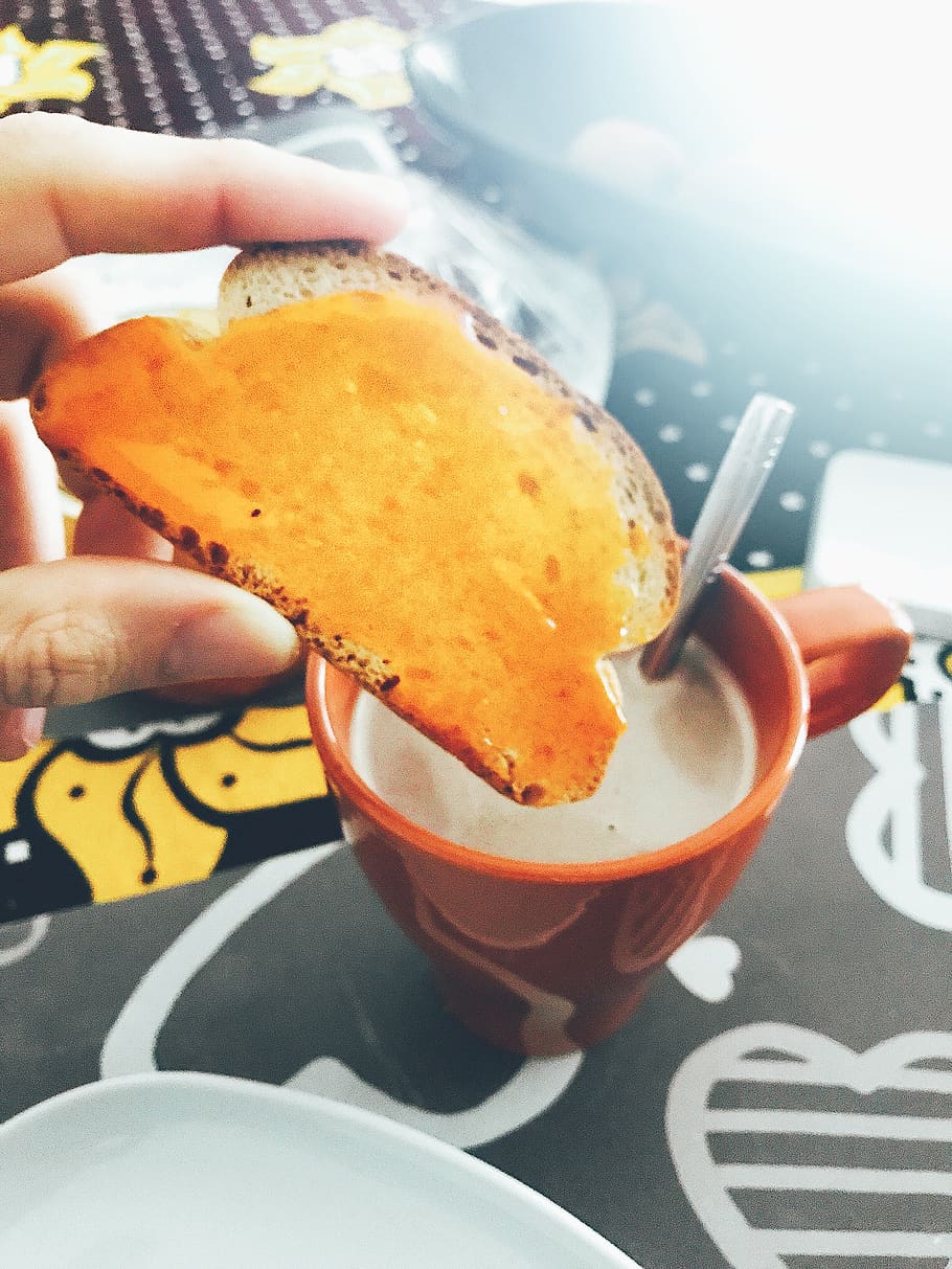 Person Holding Bread, cup, delicious, drink, eating, food, mug HD wallpaper