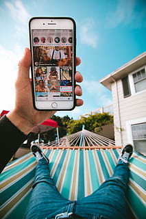 person on hammock using iPhone, hand, app, instagram, social media HD wallpaper