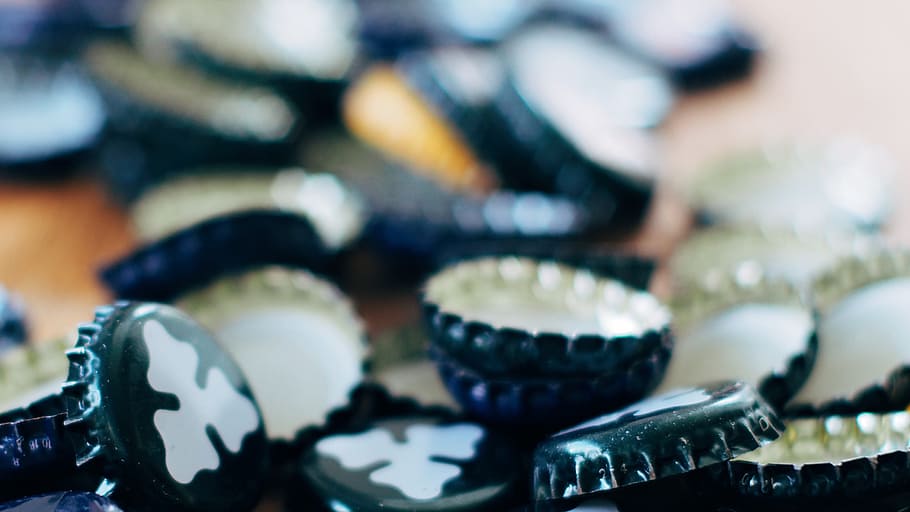 Close-up Photography of Black Bottle Cap Lot, blur, close -up HD wallpaper