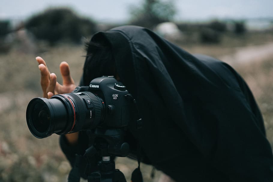Person in Black Jacket Facing Black Canon Dslr Camera, lens, man HD wallpaper