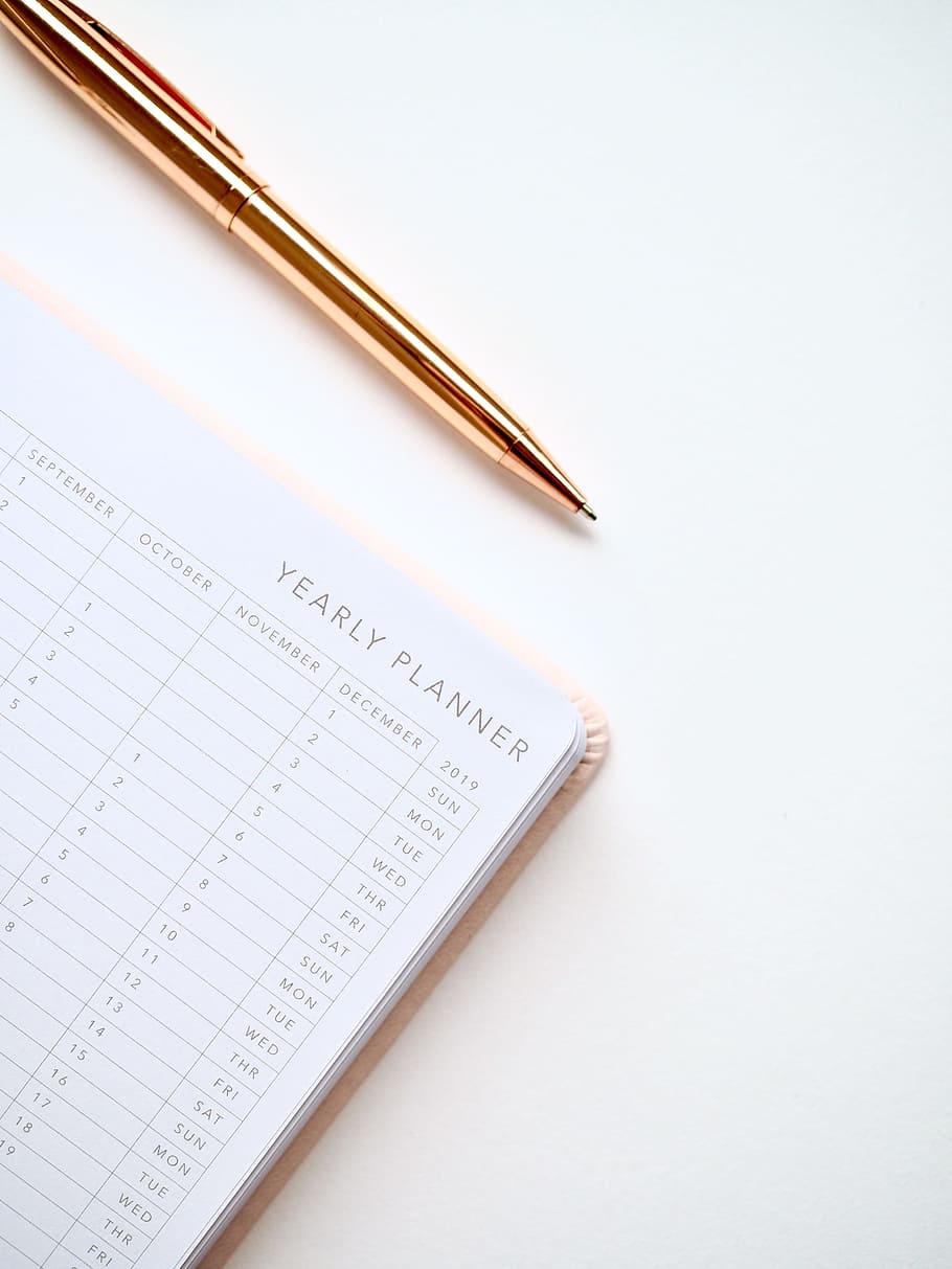 white and black yearly planner notebook, pen, stationery, diary HD wallpaper