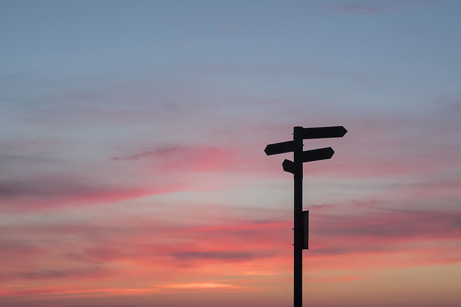 silhouette of road signage during golden hour, sky, direction HD wallpaper