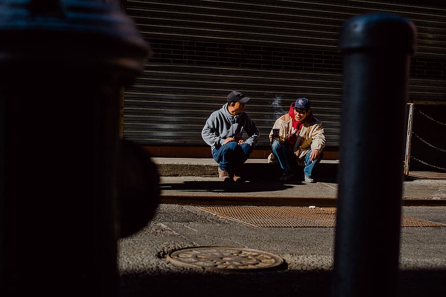 two men sitting down, human, person, apparel, clothing, pedestrian HD wallpaper