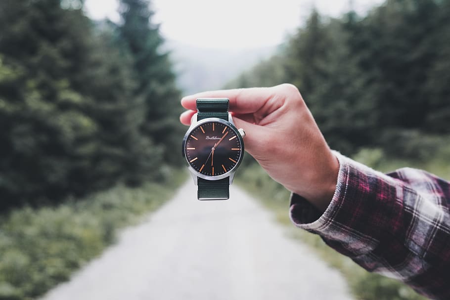 person holding round black analog watch, commercial, explore HD wallpaper