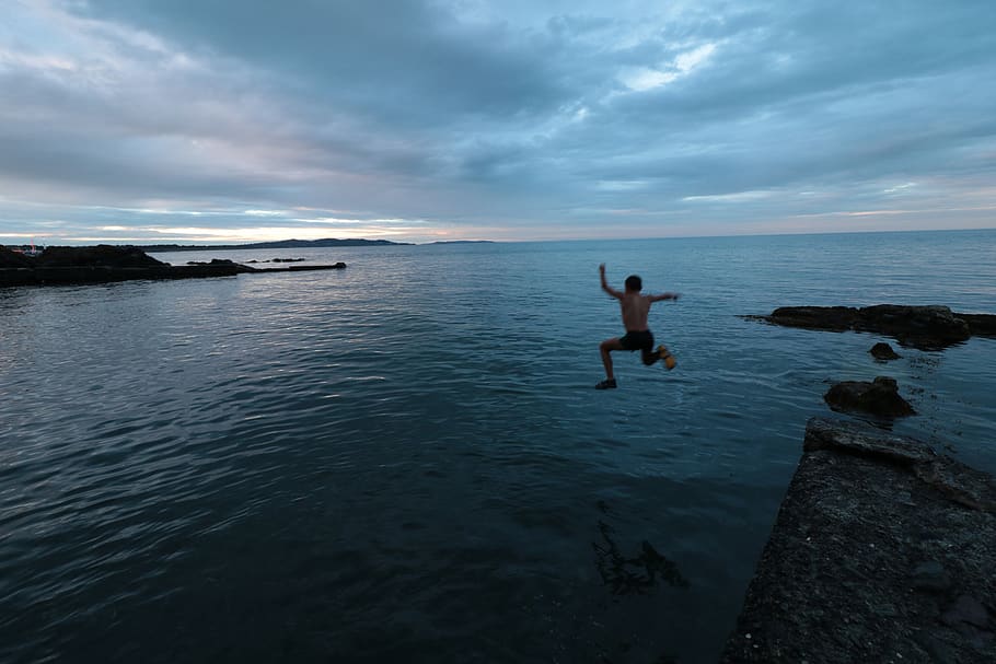 man about to jump, sea, ocean, outdoors, water, coast, nature HD wallpaper