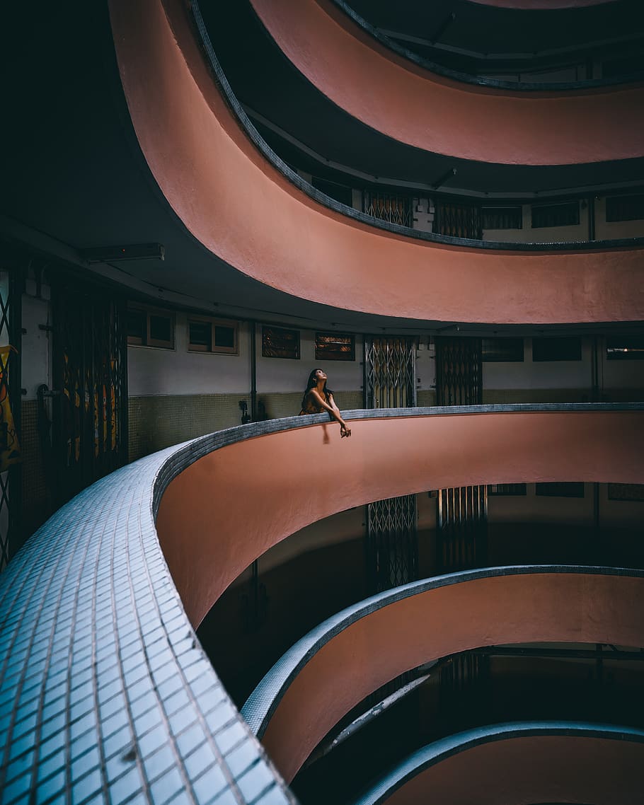 man standing on reil, handrail, banister, architecture, building HD wallpaper