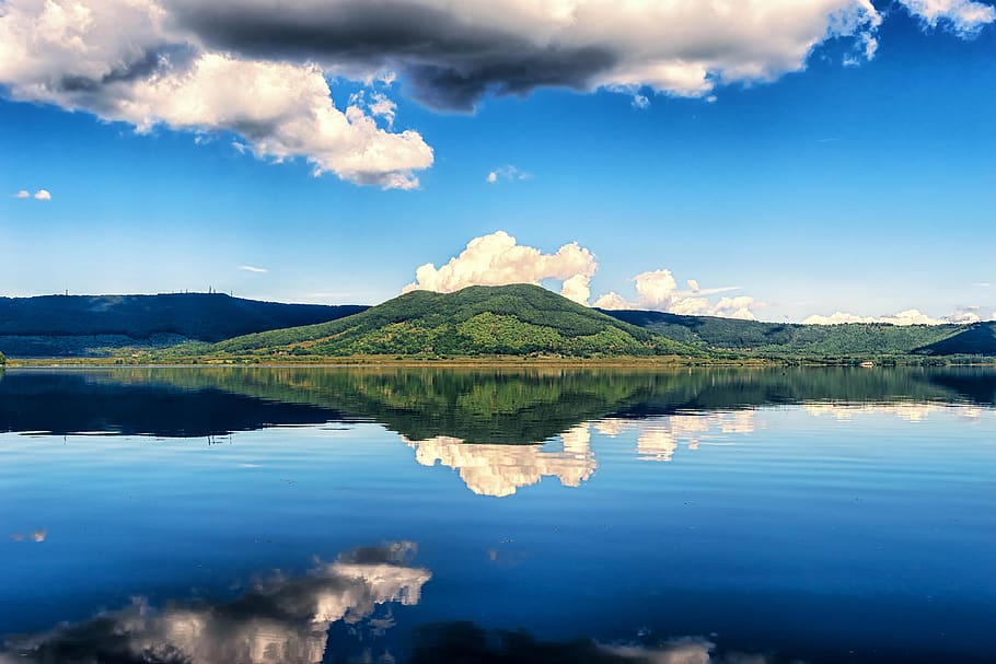 Reflection of Mountain on Body of Water, blue, clouds, daylight HD wallpaper