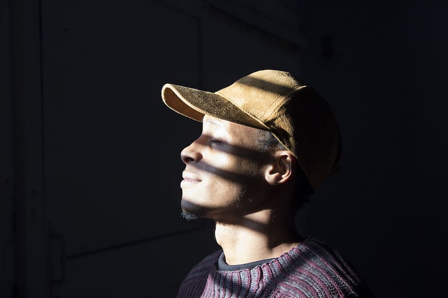 man standing wearing brown cap standing, headshot, portrait, one person HD wallpaper