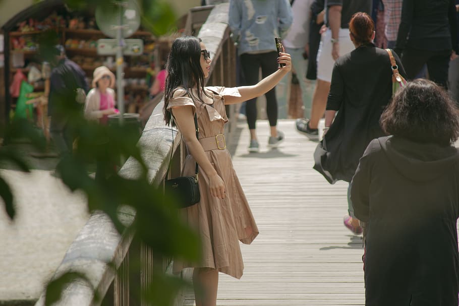 Woman Taking Selfie On Foot Bridge, girl, person, street, style, HD wallpaper