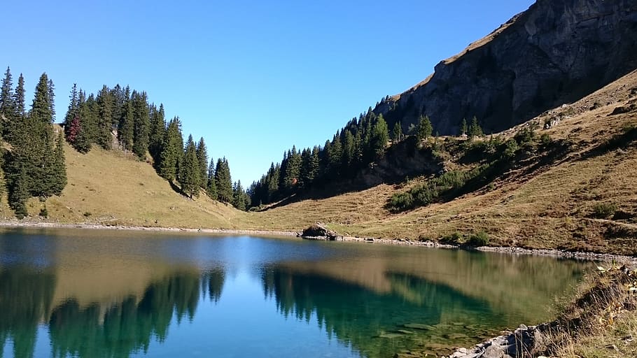 HD wallpaper: lake lioson, mountain, reflections, water, mountains ...