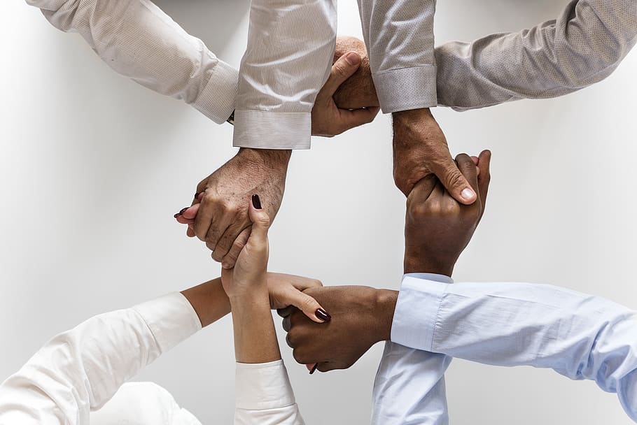 Photo of Four Persons Uniting Hands, black, collaboration, cooperation, HD wallpaper