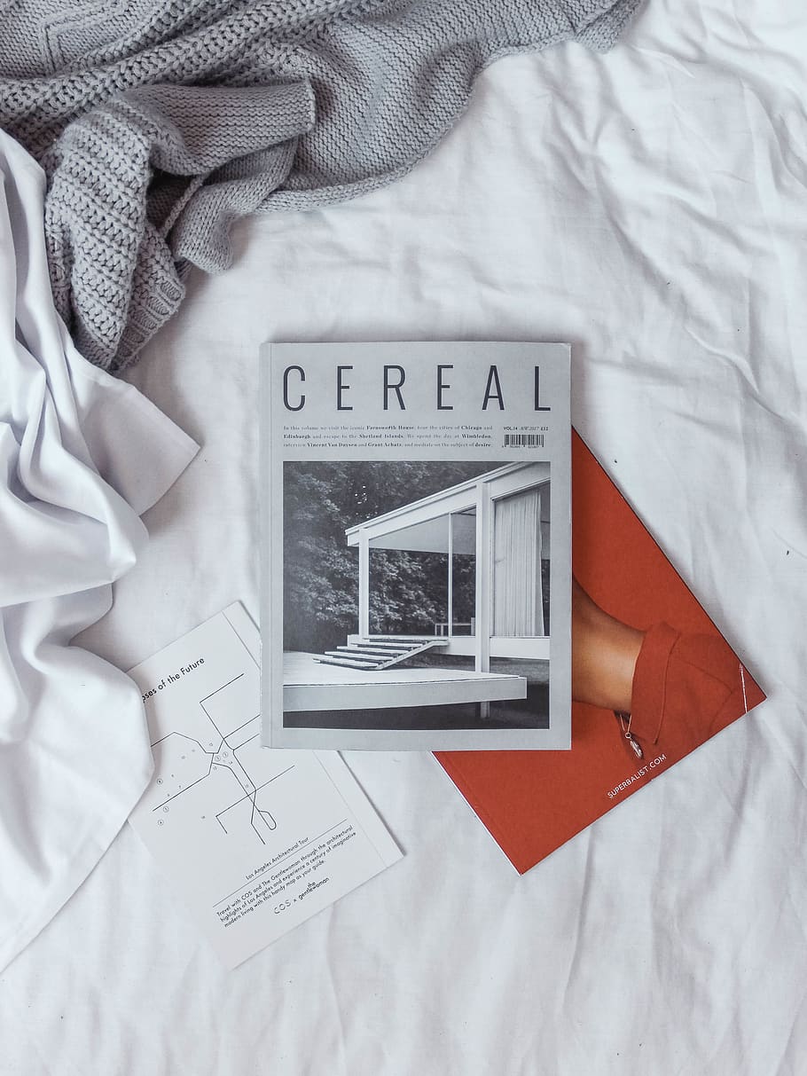 Cereal book on white textile, flatlay, flat lay, read, reading