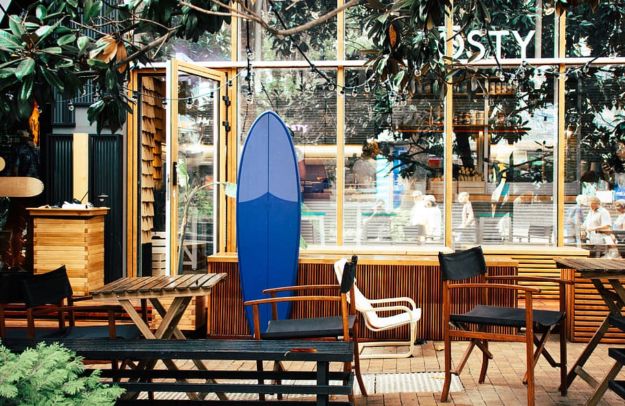 Blue Surfboard Leaning on Desk, bistro, café, cafeteria, chairs HD wallpaper