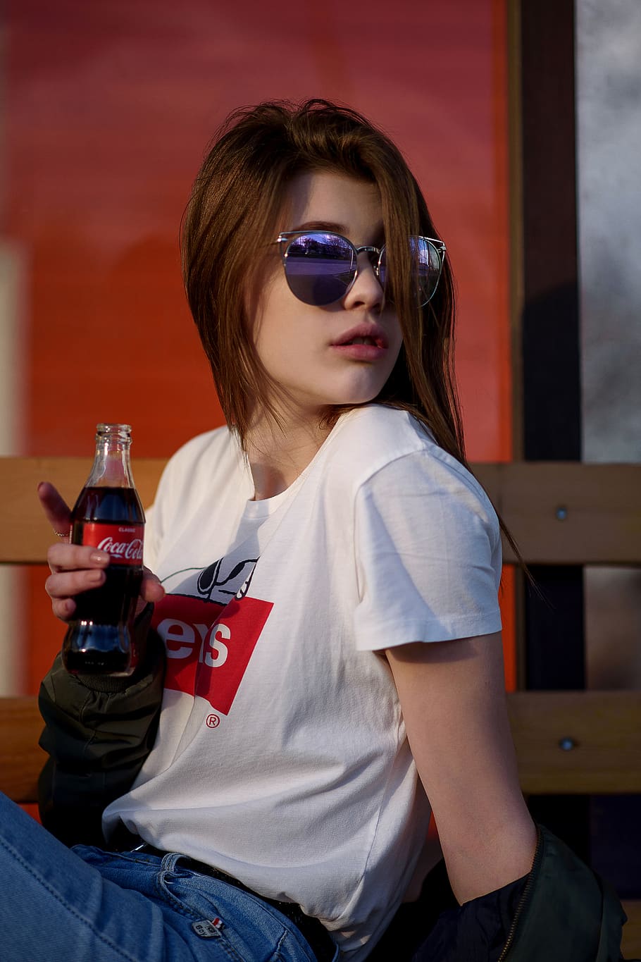 woman holding Coca-Cola bottle wearing white crew-neck Levis shirt, HD wallpaper
